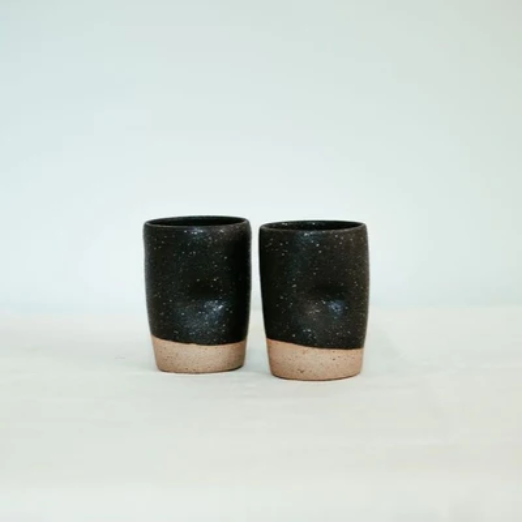 Seasonal Favourites | Elizabeth Homestead (Two hand made ceramic mugs black on top speckled and a tan base.)